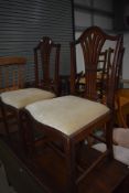 A pair of early 19th Century mahogany framed dining chairs