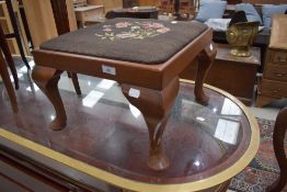 An early 20th Century Queen Anne style tapestry topped footstool
