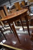 A reproduction Italian style inlay effect sewing table, having musical movement