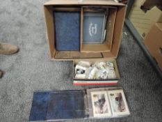A box of Cigarette Cards/Trade Cards and PHQ Cards in albums and loose