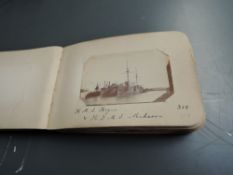 A early 20th century small photograph album containing black & white photographs of Barrow,