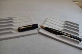 A Conway Stewart 475 leverfil fountain pen in black having a Conway Stewart 14k nib. Approx 12.8cm