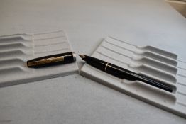 A Sheaffer Imperial I cartridge fountain pen in black with a single band to the cap having a