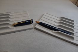 A Parker Slimfold fountain pen in blue with single decorative band to cap with Parker 5 nib.
