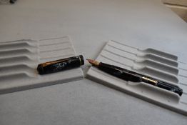 A Conway Stewart 286 leverfil fountain pen in grey marble with single narrow band to the cap