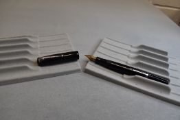 A Mabie Todd & Co Swan Self filler leverfill in black with Swan No2 nib. Approx 13cm