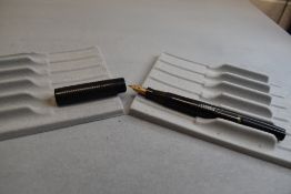 A Mabie Todd & Co Blackbird Self filler Leverfill fountain pen, in BHR a Blackbird nib. Approx 14.