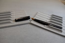 A Mabie Todd & Co Self filler leverfill fountain pen in black with chased design with Warrented 14ct