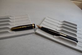 A Conway Stewart 85L leverfill fountain pen in black with single broad band to the cap having Conway