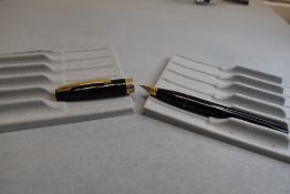 A Sheaffer Imperial III Touchdown plunger fill fountain pen in black with a single band to the cap