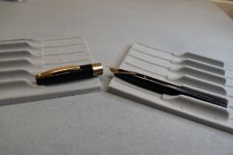 A Sheaffer Imperial IV Touchdown plunger fill fountain pen in black with a single broad band to