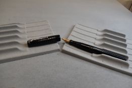 A Mabie Todd & Co Self filler leverfill fountain pen in black with chased design with Swan No1