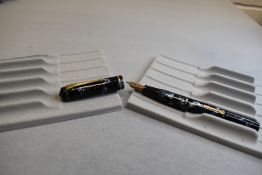 A Conway Stewart 286 leverfil fountain pen in grey marble with single narrow band to the cap