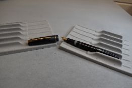 A Mabie Todd & Co Swan Leverless twist filler, in black with a single band to cap and a Swan No2