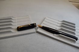 A Conway Stewart 286 leverfil fountain pen in black with single narrow band to the cap having a