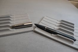 A Parker 51 fountain pen in dove grey with steel cap. Approx 13.7cm