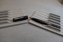 A Stephens 56 leverfill fountain pen in blue/black marble having Stephens 56 nib. Approx 12.6cm
