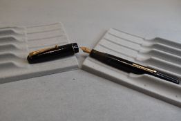 A Mabie Todd & Co Swan 3160 Self filler leverfill in black, single band to cap, with Swan No1 nib.