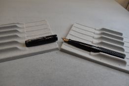 A Mabie Todd & Co Self filler leverfill fountain pen in black with chased design with Swan No1