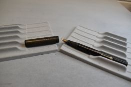 A Conway Stewart The Scribe leverfill fountain pen in BHR (discoloured) having a Conway Stewart 14ct