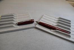 A Platignum leverfill fountain pen in red with single band to cap having Platignum 1st quality