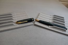 A Parker Junior Duofold fountain pen in green with narrow decorative band to the cap having Parker