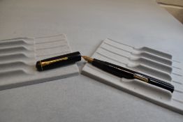 A Conway Stewart 475 leverfil fountain pen in black a Conway Stewart 14k nib. Approx 12.9cm