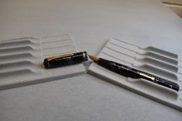 A Conway Stewart 286 leverfil fountain pen in black and grey marble with single band to the cap