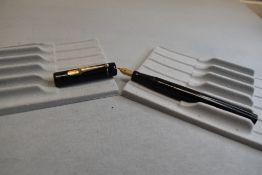 A Mabie Todd & Co Swan L205/60 Leverless twist filler, in black with a single band to cap and a Swan