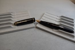 A Wyvern Perfect Pen No81 leverfill fountain pen in black with two narrow bands to the cap having
