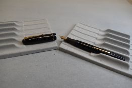 A Mabie Todd & Co Swan 3160 Self filler leverfill in black, single band to cap, with Swan No1 nib.