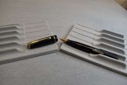 A Burnham 51 leverfill fountain pen in black with single band to cap having Burnham Super Quality
