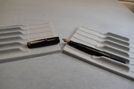 A Mabie Todd & Co Self filler leverfill fountain pen in black with chased design with Swan No1