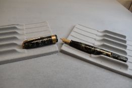 A Conway Stewart Executive 60 leverfill fountain pen in green hatched design with a broad band to