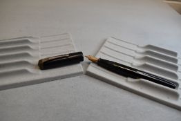 A Conway Stewart 28 leverfill fountain pen in black with single band to cap having a Conway