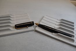 A Mabie Todd & Co Swan L212/60 Leverless twist filler, in black with two bands to cap and a Swan No2