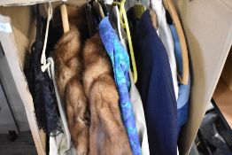 A good selection of vintage clothes including mink coats and nurses cape