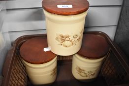 Three ceramic kitchen storage jars by Denby