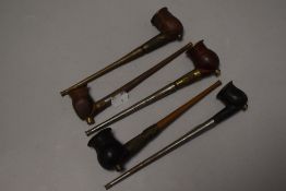 A group of five tobacco smokers popes, each with brass-mounted turned wood bowls and metal (steel,