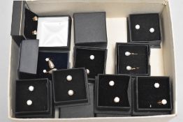 Nine pairs of stud earrings including diamante and pearl