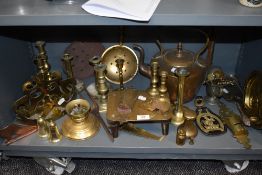 A selection of mixed brass and copper wares, to include ejector candlesticks, copper kettle,