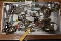 A selection of cutlery and table wares including Scotch thistle tea spoons