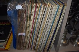 A collection of vintage vinyl albums including jazz and classical interest