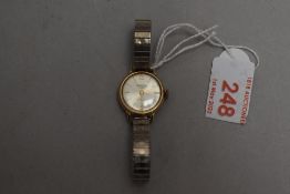 A lady's 9ct gold wrist watch by Thermidor having baton & Arabic numeral dial to circular face on