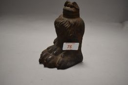 A Victorian lion foot form door or similar stop