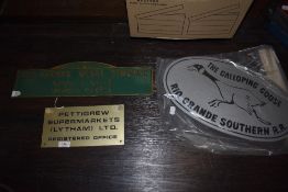 A selection of reproduction signs including Kendee model company and The Galloping Goose