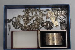 A small selection of white metal jewellery including dolphin pendant stamped 925, Mexican plaque