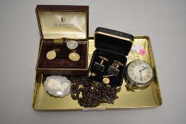 A small selection of costume jewellery including commemorative ceramic brooch, rosary beads,
