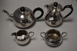 A silver-plated four piece teaset, marked JT&Co to base