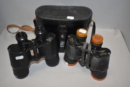 Two pairs of vintage binoculars including Tecnar Swift 7x50 and similar Russian pair